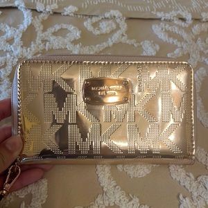 Michael Kors pale peach/ rose gold colored wallet